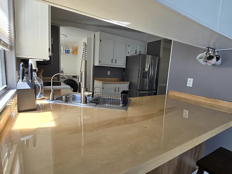 Kitchen
"Functional and welcoming kitchen with plenty of storage space."