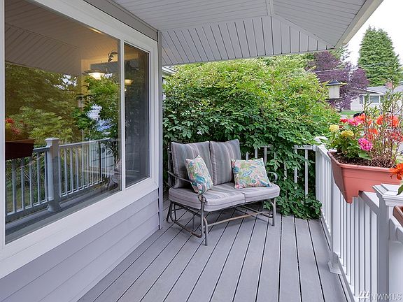 Relax on the front porch on the quality Trex deck.