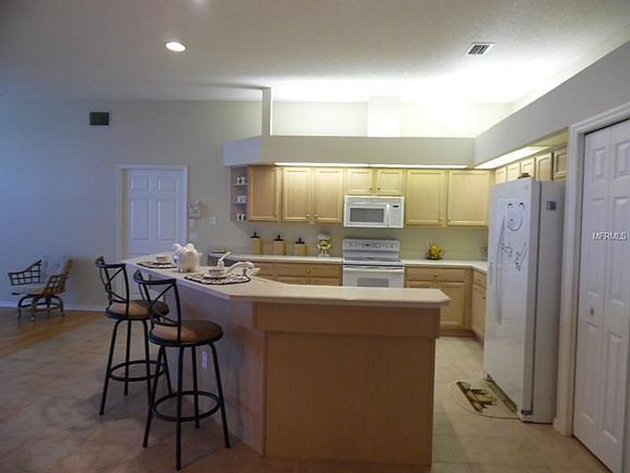Kitchen with breakfast bar and tons of counter space