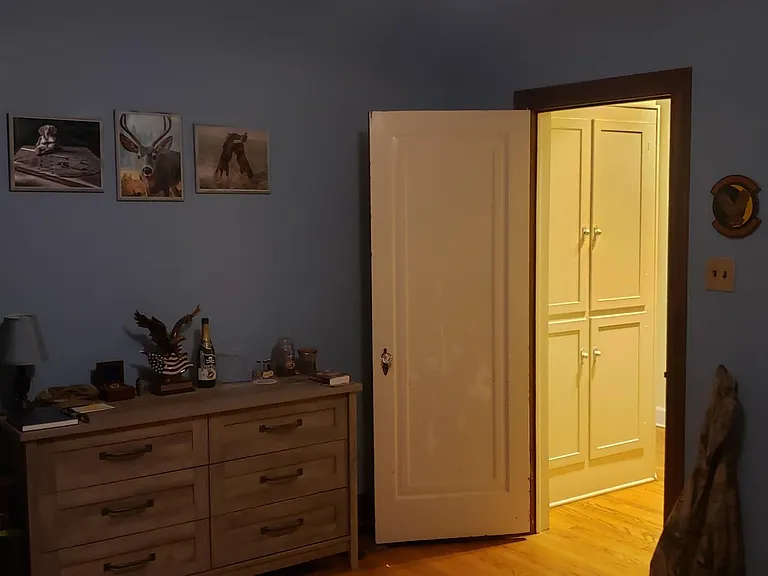Bedroom looking toward hallway with closet to the right