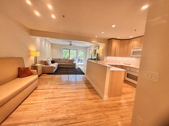 Hardwood floors and other premium finishes throughout the living areas