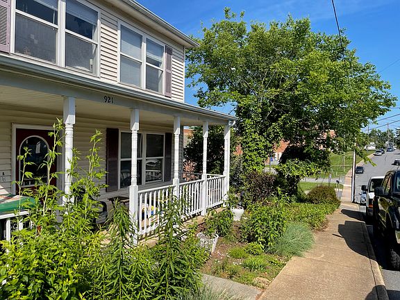 Triplex home on Henry Ave. Entrance to studio apartment C is at right.