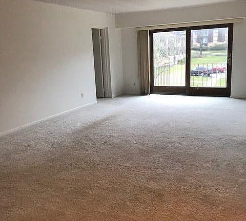 Living Room that leads to a good size balcony