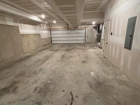 HUGE garage! 2-4 car- full basement is garage so you can park 2 side by side & potentially 2 in front depending on length- I believe standard size will fit *Pictures are of another Fairfax plan, I believe only difference is it's a mirror image/flipped