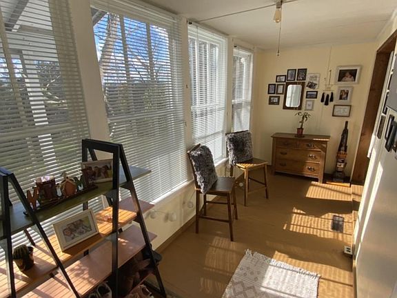 This photo shows the heated porch upon entering the apartment.