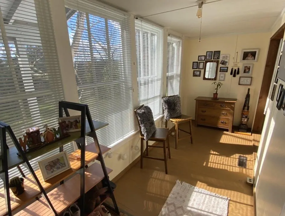 This photo shows the heated porch upon entering the apartment.