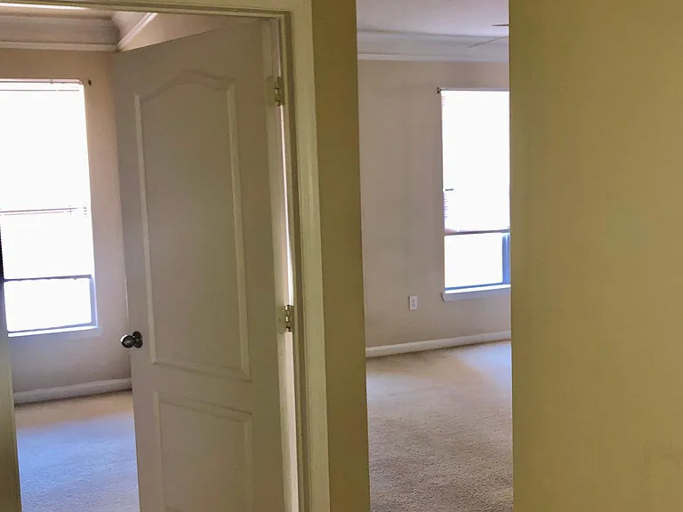 Entry to master bedroom and to living kitchen areas - as empty space