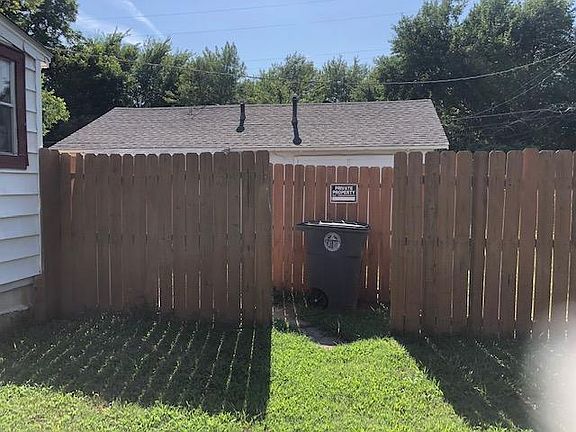 Privacy-fenced entry.