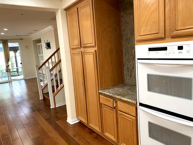 View of kitchen from near the fridge