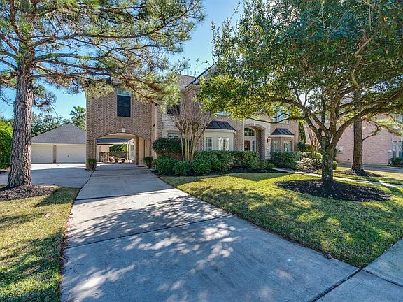 Oversized 3 car garage with plenty of extra driveway and covered parking. Such a bonus to have the additional protected space for your special vehicles.