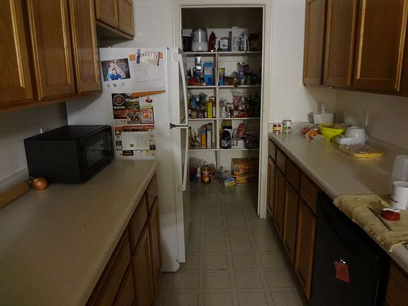 Kitchen (extra pantry for 6-person condos)
