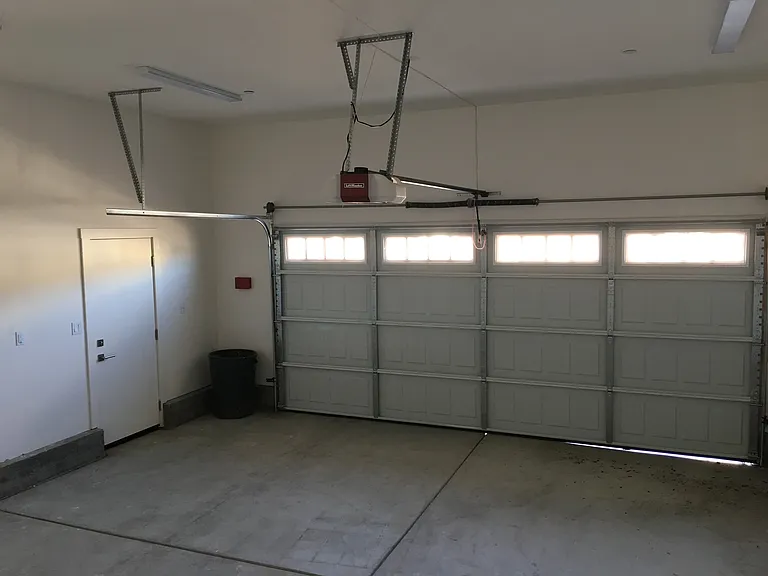 2-car garage, finished with excellent lighting and an automatic door opener.