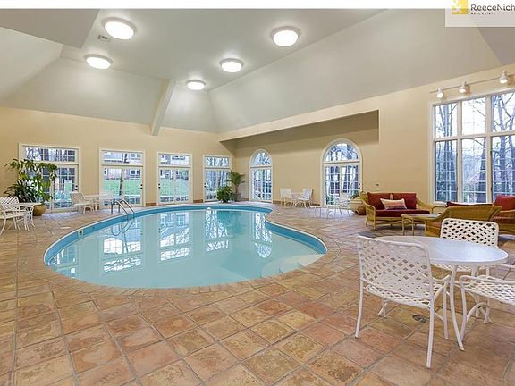 Swim year round in the indoor pool with beautiful Saltillo tile decking. Multiple French doors and t
