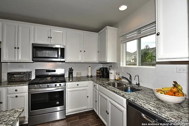 7807 Cottonwood Rdg — Photo 16