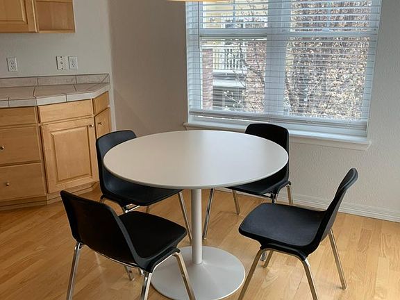 Dining area. Table and chairs do not come with the unit.