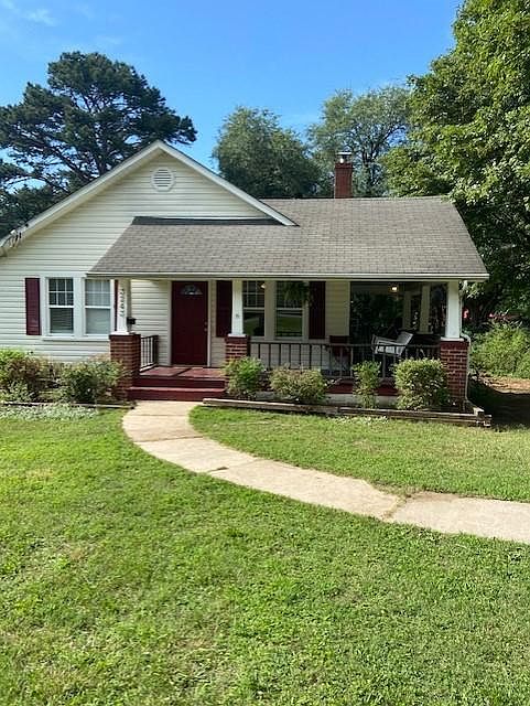 Wrap-around Front Porch with Swing