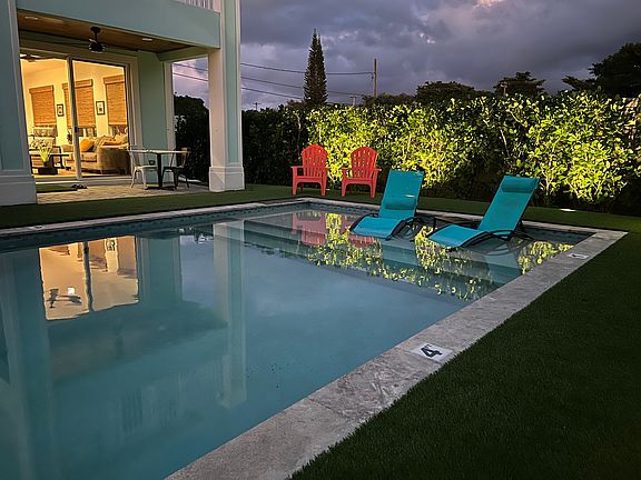 Private outdoor space with soft lighting at night