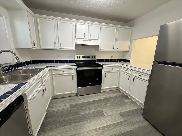 9440 Live Oak Pl #102 — Photo 2