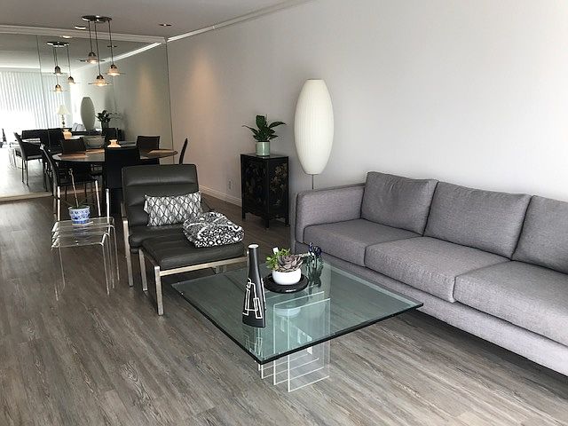 Living room with dining room in background. Current picture