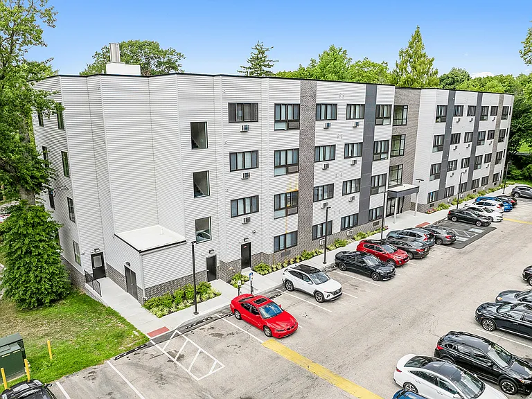 Explore this contemporary apartment complex offering convenience and style in a serene setting.