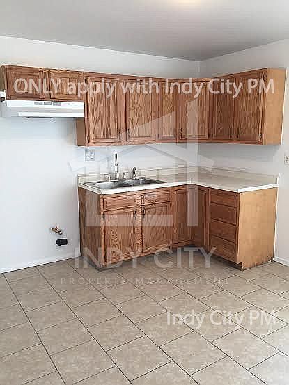 1st image of 6658 E 43rd Pl