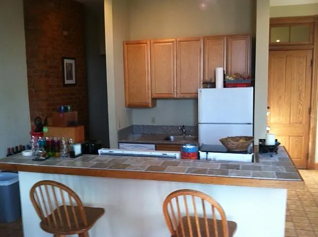 Lots of space to either side of kitchen for creative use.
