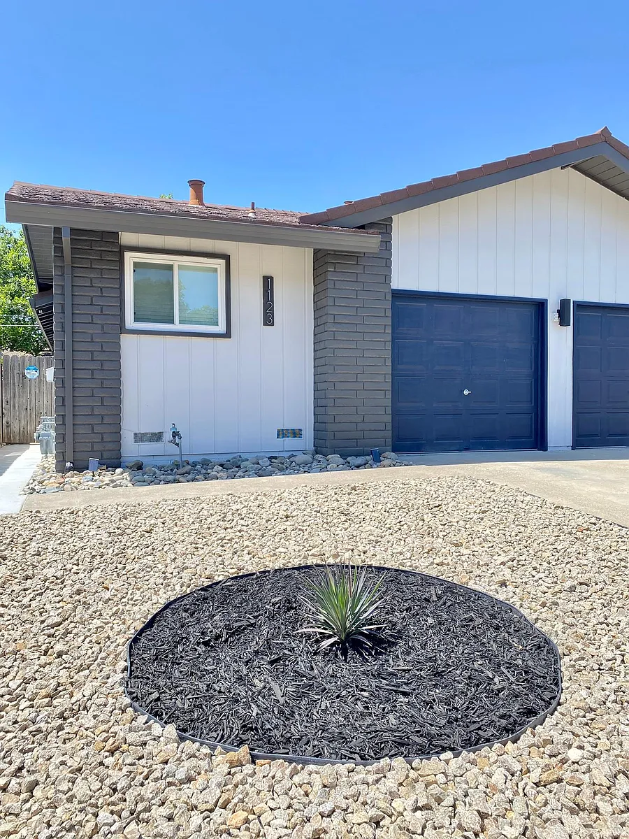 Fresh coat of exterior paint and new low-maintenance drought-resistant landscaping. - 1123 Clinton Rd