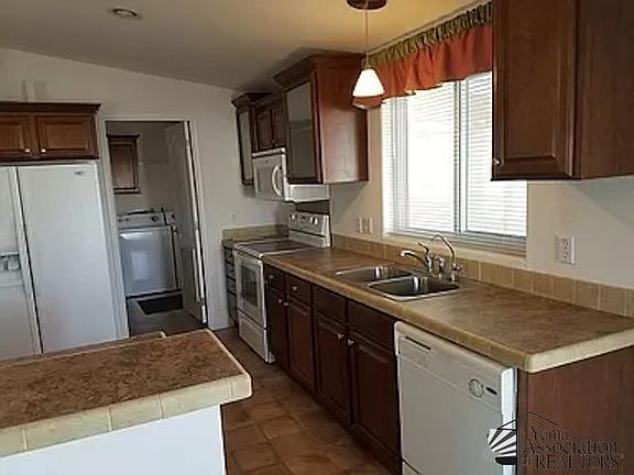 5th image of 13827 E 49th Ln