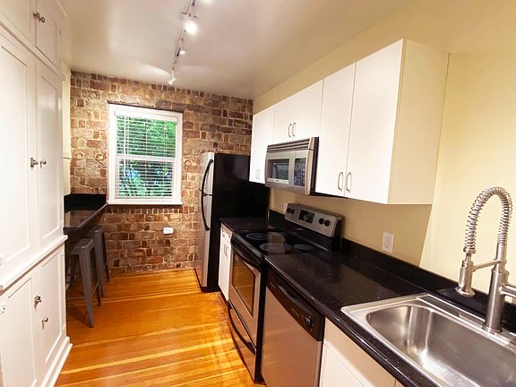 Stainless Silver Appliances, Granite Counters and Breakfast Bar