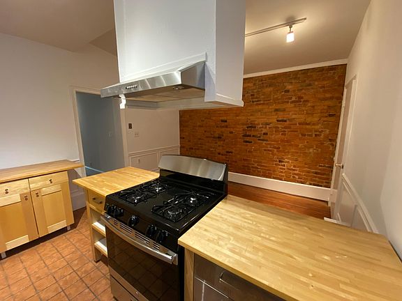 Kitchen opens into dining space.