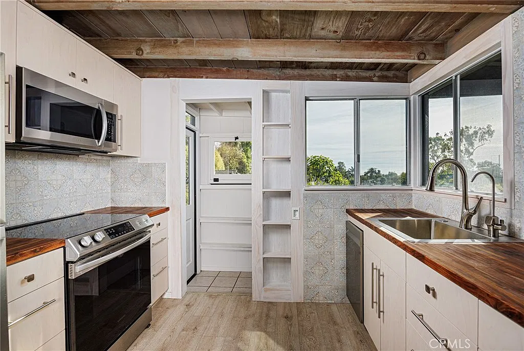 3 bed, 1.5 bath, 1100 sqft, $6,750 — Photo 3