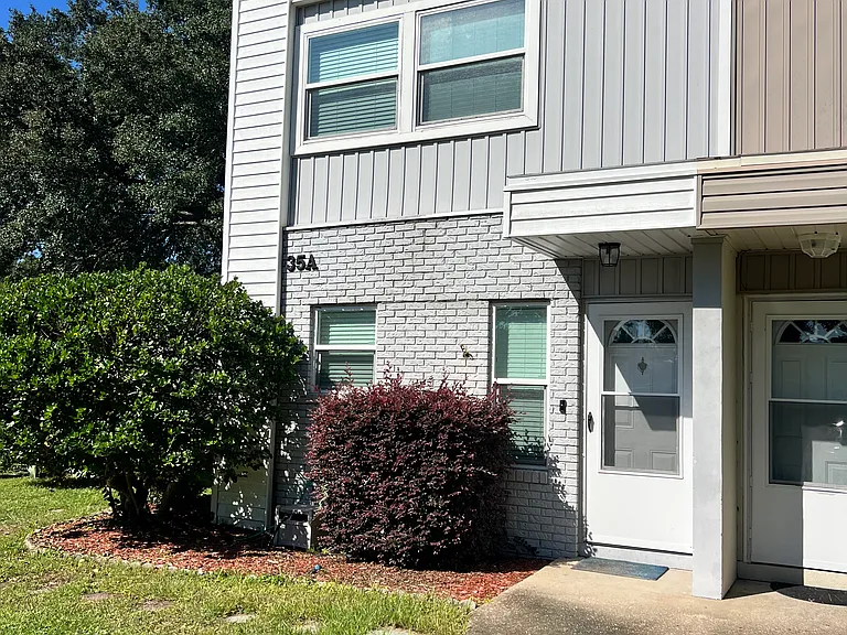 End unit has easy access to off street parking in front of unit.