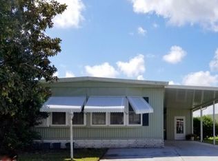 1069 Manila Dr, Barefoot Bay, FL 32976