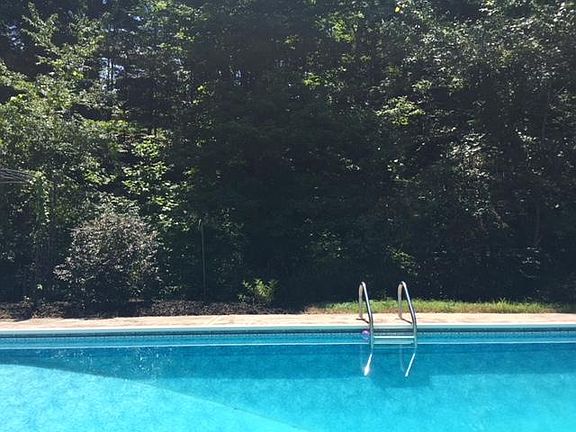 Large Pool tucked in at Bottom of Beautiful Ridge