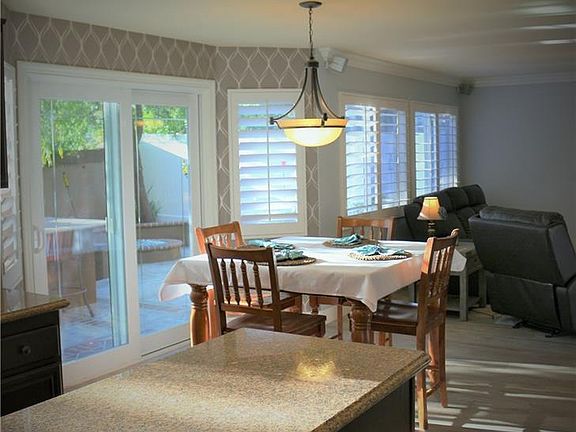 Kitchen Dining Area with French Doors leading out to backyar