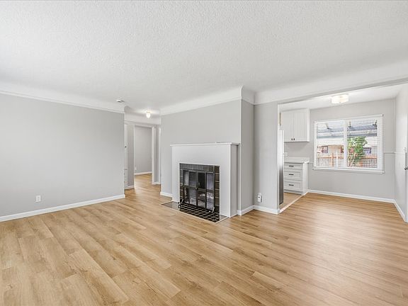 Wood-burning fireplace in living room