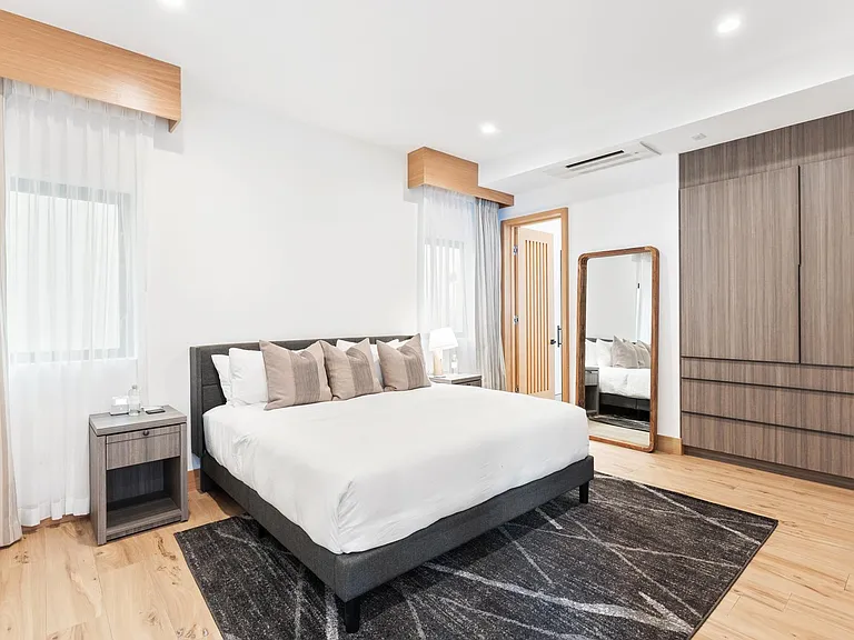 A clean, comfortable bedroom to relax.