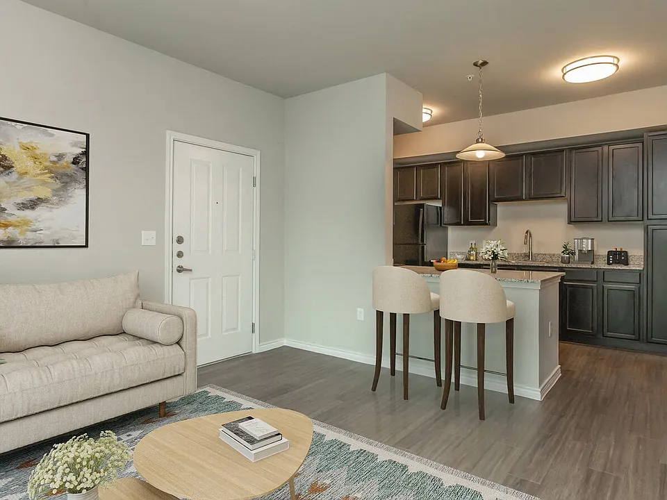Spacious floor plans include wood inspired flooring throughout common areas