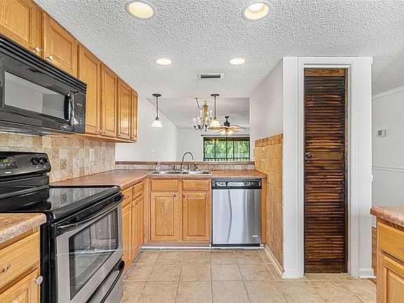 3rd image of 108 WOODLANDS COURT #108