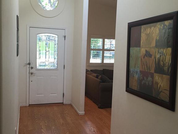 High ceilings with skylights and large windows.