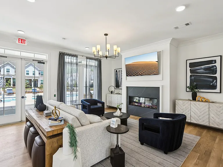 Resident Clubroom and Lounge with TV and Fireplace