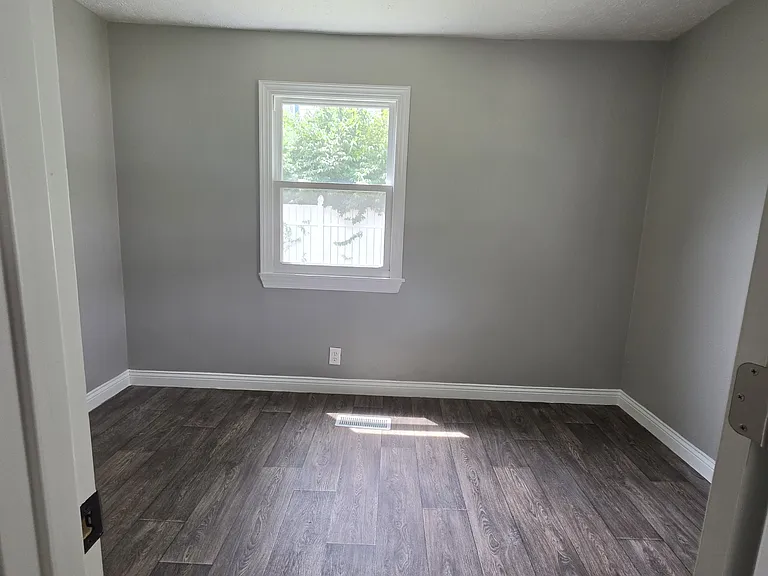 Bonus room. Could be a bedroom, playroom, or even an office. It is located off the living room