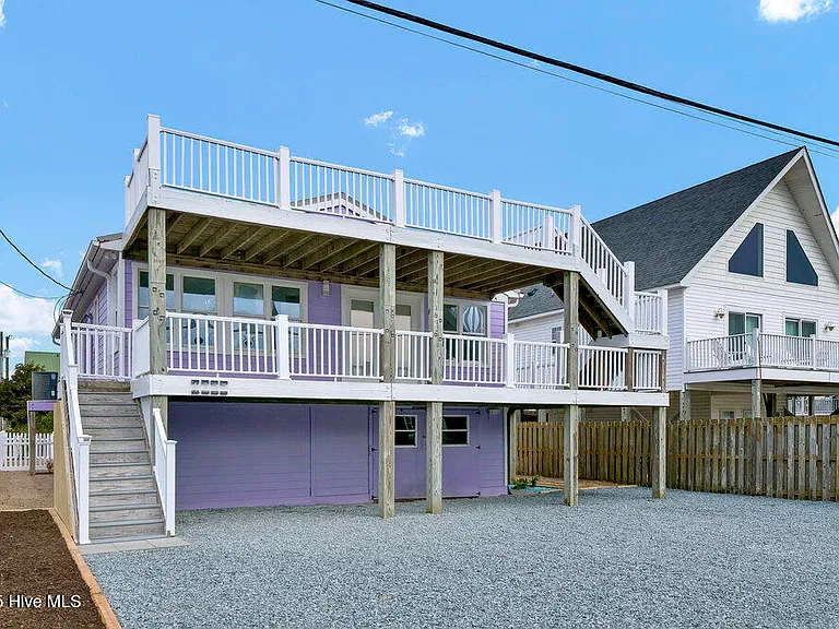 1207 N Topsail Dr — Photo 1