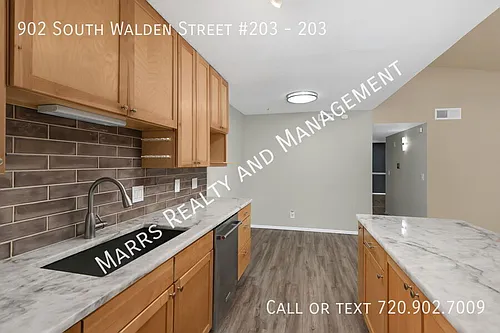 902 S Walden St #203 Photo 1