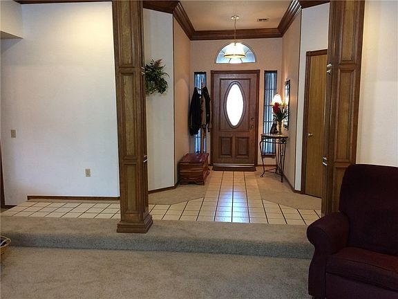 Large entry with a beautiful leaded glass door