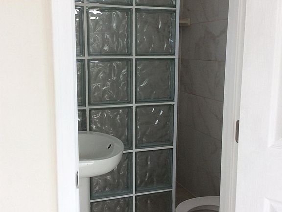 Upstairs 3/4 bath with glass-block shower enclosure