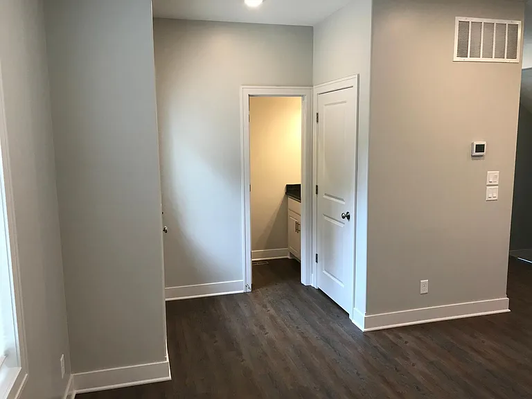 1st floor Powder Bath and Pantry shelves to right