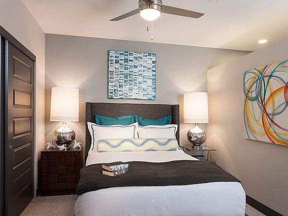 Modern lighting throughout with ceiling fans