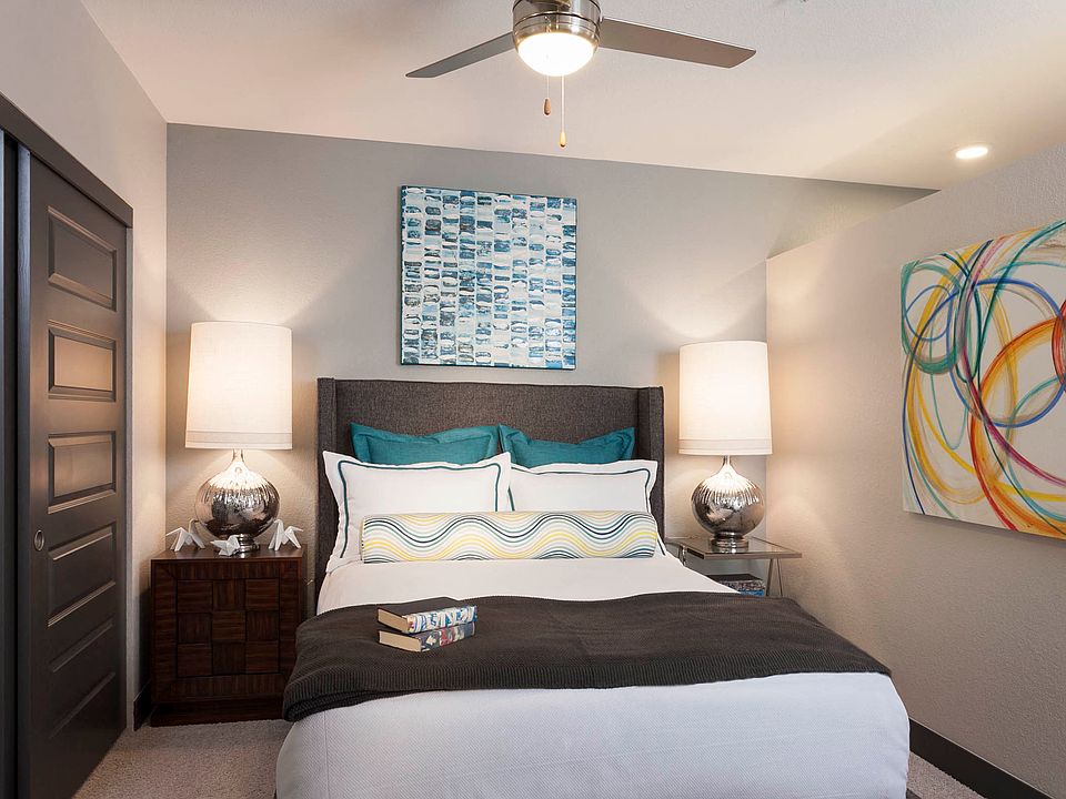 Modern lighting throughout with ceiling fans