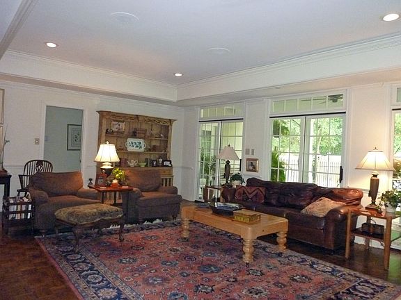 Den overlooks private backyard